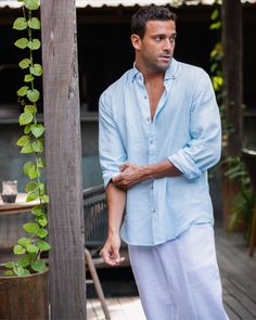 Classic shirt crafted from lightweight linen. With long sleeves, coconut buttons, button fastening at the cuffs, and buttons at the corners of the collar. A true wardrobe staple. • Regular fit • Shirt style collar • Buttoned • Long sleeves Shirt With Buttons, Wrinkled Clothes, Shirt Linen, Linen Shirt Men, Linen Clothing, Mens Linen, Clothing Care, Linen Clothes, Classic Shirt