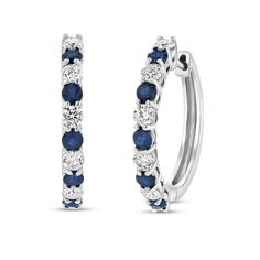 Let your vibrant personality shine through these clever blue sapphire and diamond alternating ten-stone hoop earrings in white gold. Created in 14K white gold Each hoop glistens with an alternating row of bright blue sapphires and shimmering diamonds. These 1/2 ct. t.w. diamond earrings secure with hinged backs. Blue Hoop Earrings With Prong Setting For Anniversary, Blue Hoop Earrings With Prong Setting, Blue Diamond Round Hoop Earrings, Sapphire Hoop Earrings With Prong Setting, Blue Diamond Hoop Earrings, Fine Jewelry Sapphire Hoop Earrings In White Gold, Blue Diamond Hoop Earrings Fine Jewelry, Sapphire Hoop Earrings For Anniversary, Sapphire Hoop Earrings For Anniversary Fine Jewelry