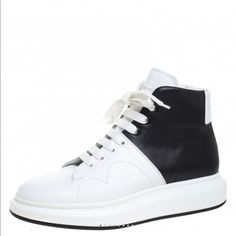 Never Worn With Box! These Sneakers From The House Of Alexander Mcqueen Are Effortlessly Suave And Amazingly Stylish. Crafted From Leather And Designed In A Classic Combination Of White And Black Shades With Lace-Ups On The Vamps. Men’s Eur 43 / Us 9 Modern White Calf Leather High-top Sneakers, Modern High-top Custom Sneakers In Calf Leather, Modern High-top Custom Sneakers With Medium Fit, Modern Medium Fit High-top Custom Sneakers, Modern High-top Custom Sneakers, Designer White High-top Sneakers With Leather Sole, Luxury White Sneakers With Rubber Heel Cap, Modern White Custom Sneakers With Rubber Heel Cap, Shoes Alexander Mcqueen