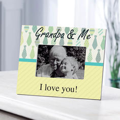 a grandpa and me picture frame on a table