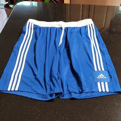 Drawstring Waistband, Hand Pockets, 100% Polyester, Nwt Blue Shorts With Three Stripes For Summer, Adidas Blue Shorts For Summer, Adidas Drawstring Shorts, Adidas Blue Shorts With Three Stripes, Adidas Blue Sports Shorts, Sporty Blue Basketball Shorts, Casual Team-colored Basketball Shorts, Adidas Soccer Shorts, Adidas Cotton Bottoms With Built-in Shorts