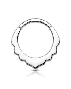 a white gold ring with a scalloped design on the front and back side