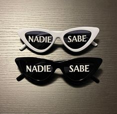 two pairs of sunglasses that say nadie sabe and sade on the side