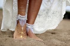 *To creating elegance at the beach wedding.* Combined the gorgeous harmony of lilac beads and rhinestone. Completed with magnificent tassels of lilac beads. Every stage was made by hand. It can be used with shoes or barefoot. All of my products are hand made by me. So i can apply all the changes you want (color, size, etc.)Please feel free to contact about this. I can send them worldwide, please contact about it! Please do not hesitate to contact to get more information about the product. PACKAG Bohemian Beaded Anklet For Beach Wedding, Handmade Silver Anklets For Beach Wedding, Elegant Beaded Anklets For Beach, Bohemian White Wedding Anklets, Beaded Anklets For Summer Destination Wedding, White Bohemian Wedding Anklets, Beaded Anklets For Destination Wedding In Summer, Bohemian Toe Ring Jewelry For Destination Wedding, Bohemian Beaded Jewelry For Destination Wedding