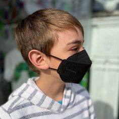 Child wearing kids XS extra small black breatheteq KN95 respirator face mask with earloops I M Sick, Nose Strips, 3d Shape, Sensitive Teeth, Black Mask, Pressure Points, Kids Black, Mask Making, Latex Free