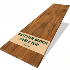 a butcher block table top with the words butcher block table top on it's side