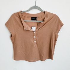 Urban Outfitters Nwt Tan Ribbed Cropped Henley Tee Tagged Size: L Fits: M-L Condition: Nwt Thanks For Checking Out My Closet! Cropped Henley, Henley Tee, Urban Outfitters Tops, My Closet, Urban Outfitters, Womens Tops, Crop Tops, Closet, Women Shopping