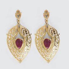 ⚫ This Earrings made with ruby & diamonds in 14k yellow gold, 925 sterling silver,⚫ Pave Diamond Gemstone Earrings 925 Sterling Silver Jewelry.⚫ Gemstone Earrings, Diamond Earrings , Silver Earrings , Everyday Jewelry⚫ Special customize for Mother's day, Anniversary, Birthday Gift, Valentine, Christmas. ⚫ Item Details:Gross Weight:12.64 Grams14k Yellow Gold Weight:0.322 Grams925 Sterling Silver Weight:10.42 GramsDiamond Weight:0.89 CaratsGemstone Weight:8.6 CaratsItem Size: 57 x 27 mmItem SK Fine Jewelry Bridal Earrings For Formal Occasions, Formal Bridal Fine Jewelry Earrings, Luxury Pierced Chandelier Earrings For Formal Events, Luxury Earrings With Intricate Design, Fine Jewelry Teardrop Bridal Earrings With Elegant Design, Luxury Hallmarked Ruby Earrings, Luxury Yellow Gold Chandelier Earrings For Anniversary, Luxury Pierced Chandelier Earrings For Anniversary, Luxury Dangle Teardrop Earrings For Anniversary