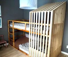 a bunk bed with wooden slats in a room