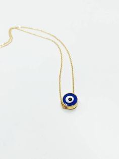 Dainty evil eye necklace is adjustable. This Turkish jewelry would be the great gift as a protection jewelry. Lenght of the nazar necklace is 45 cm (17.5 in) Blue Evil eye bead is 1 cm (0.3 in) For more evil eye necklaces, click the link below; https://www.etsy.com/shop/EyeDesignsbyGG?ref=search_shop_redirect&section_id=30285329 Evil Eye Charm Necklace With Round Pendant As Gift, Evil Eye Charm Necklace With Round Pendant For Gifts, Blue Necklace With Adjustable Length For Gifts, Adjustable Evil Eye Round Pendant Necklace, Evil Eye Round Pendant Necklace Gift, Minimalist Evil Eye Charm Necklace, Adjustable Round Evil Eye Necklace, Adjustable Evil Eye Spiritual Necklace, Adjustable Spiritual Evil Eye Necklace