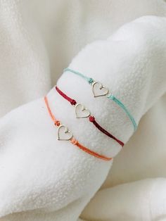 These heart bracelets are waterproof and great for anyone who is often doing outdoor activities. They would make a nice gift. Stack these together, with other bracelets, or wear them by themselves! They are perfect for everyday wear! ∙ ∙ ∙ ∙ ∙ ∙ ∙ ∙ ∙ ∙ ∙ ∙ ✦ MATERIALS ✦ * High-Quality Waxed Linhastia Polyester Cord (This cord is waterproof!) * Heart Charm ∙ ∙ ∙ ∙ ∙ ∙ ∙ ∙ ∙ ∙ ∙ ∙ ✦ SIZES ✦ These bracelets are adjustable from about 5.5 Inches to 8.5 Inches. They are made to order so if you need a custom size please let me know. I'm happy to do that for you. ∙ ∙ ∙ ∙ ∙ ∙ ∙ ∙ ∙ ∙ ∙ ∙ ✦ QUESTIONS/PROBLEMS ✦ If you have any questions, please feel free to ask! I hope to provide a positive experience for my customers. If you have any problems with your purchase, please let me know! I'll help howev Cheap Adjustable Friendship Bracelets For Women, Trendy Cheap Bracelets For Gifts, Casual Cheap Adjustable Friendship Bracelets, Cheap Handmade Heart Friendship Bracelets, Cheap Handmade Heart Bracelet As Gift, Cheap Minimalist Friendship Bracelets For Women, Cheap Trendy Heart Bracelet For Friendship, Cheap Minimalist Friendship Charm Bracelet, Cheap Minimalist Friendship Bracelets For Best Friend Gift