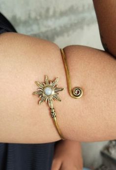 Moonstone Boho Upper Arm Bracelet, Gold Sunburst Arm Cuff, Goddess Bracelet, Spiral Arm Cuff, Gemstones Armlet, Sun Bohemian Jewelry Gift METAL :- Brass ❥ Customers satisfaction is our biggest priority, please contact us with any questions/queries for future or existing orders, and we will do our best to make sure you are happy with your order. ♥ Please Make Sure to Include The Correct Address During Before Order. You Can return Item within 30 Days After Successful Delivery. We Offer 100% Money Bohemian Spiral Hand Wrapped Bracelets, Handmade Bohemian Spiral Bracelets, Handmade Spiral Bohemian Bracelets, Adjustable Bohemian Brass Bangle, Handmade Bohemian Spiral Bracelet, Bohemian Spiral Cuff Bracelet Gift, Bohemian Spiral Cuff Bracelet As Gift, Adjustable Bohemian Brass Cuff Bracelet, Bohemian Adjustable Spiral Jewelry