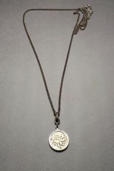 indian head skull carved coin on oxidized silver flat links chain MATERIALS : silver & bronze LENGTH: 22/24" Silver Quotes, St Christopher Necklace, St Michael Pendant, Head Skull, Carved Skull, Silver Gold Jewelry, Tarnished Jewelry, Citrine Pendant, Horn Pendant