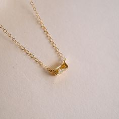 For a stunningly subtle (yet powerful) reminder of light and optimism, this Tiny November Birthstone Necklace is your go-to! Designed with a dainty citrine-hued CZ, it's a small but meaningful reminder of abundant opportunities and warm positivity. NECKLACE FEATURES: 16k gold plated citrine hued cubic zirconia birthstone charm 14k gold filled chain & findings Necklace comes with coordinating November birth month card Delicate Everyday Birthstone Gemstone Necklace, Delicate Birthstone Necklace With Gemstone, Everyday Delicate Birthstone Necklace, Delicate Birthstone Necklace With Adjustable Chain, Minimalist Everyday Birthstone Necklace With Delicate Chain, Adjustable Gold Birthstone Necklace For Everyday, Gold Delicate Birthstone Necklace For Everyday, Delicate Gold Birthstone Necklace For Everyday, Everyday Gold Birthstone Gemstone Necklace