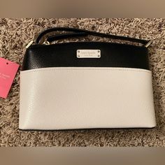 Great For A Gift For The Holidays!! For A Family Member, A Friend Or Yourself. Kate Spade Black & White Crossbody Handbag, Nwt! Authentic Black And White Kate Spade Crossbody Handbag. Adjustable Buckle Crossbody Strap! Tags On Handbag, Brand New, Never Used Still Has Stuffing Inside. There's An Outside Pocket On The Handbag And Pockets On The Inside. Zipper Shut Handbag. Love This Beautiful Black And White Crossbody Handbag, It Can Go With Anything. White Kate Spade Bag With Zipper Closure, Kate Spade Bag, Kate Spade Crossbody, Crossbody Strap, Cross Body Handbags, Kate Spade, Bag Lady, Buckle, Black White