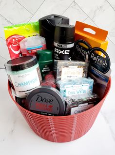 A gentleman's self-care gift basket wrapped in cellophane tied with a bow is filled with products selected for him to feel special and pampered after every use. Great gifts for Father's Day, Valentine's Day, Birthdays, Anniversary, Celebrations, Graduation, Holidays, Thank You, or Just Because.  What's Included 1) Red Basket (1) Axe Body Wash 16oz (1) Axe Spray Aluminum Deodorant 5.1oz (1) Old Spice Swagger Stuck Deodorant 3oz (1) Gillette Razor with (1) Blade Cartilage  (1) Dove Lotion 2.53oz (1) Airheads Extreme 4.5oz (1) Loofah  (2) Car Clip Fresheners 0.07oz (1) Cool Water Artisan Soap 4.8oz (1) Champion Artisan Soap 5oz (1) Suit & Tie Artisan Soap 4oz (1) Champion Whipped Soap & Shave Cream 8oz Self Care Basket For Men, Airheads Extreme, Dove Lotion, Winter Gift Basket, Gillette Razor, Care Basket, Red Basket, Baskets For Men, Bachelor Gifts