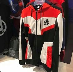 the avengers hoodie is on display in front of other clothing and accessories at the store