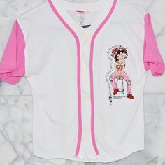 Deadstock 1996 Betty Boop Pink & White Button Up Jersey Youth M Fits Adult Xs/S White T-shirt With Button Closure For Spring, Trendy White Top For Playwear, Casual Tops With Buttons For Playwear, Trendy White Top With Snap Buttons, Trendy White Top, Cute White Tops With Buttons, Spring Playwear Tops With Buttons, White Fitted T-shirt With Button Closure, Retro White Buttoned Tops