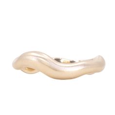 Organic, Unique Flowing solid gold ring No need to sacrifice style for sustainability. These exquisite hand-carved wavy bands are crafted from 100% recycled gold and platinum, symbolizing the serene riverbeds where we find our precious gems. Wear these tokens of nature's beauty on their own, or stack them with our dewdrop or solitaire rings - either way, you'll be reminded to appreciate the environment and take steps to conserve it.The Alluvial Band - your perfect everyday accessory - is available in both a brushed/satin or polished finish. Choose from our range of gold colors, karats, and ring sizes. Each ring is crafted from weighty and solid metal, measuring a generous 2-2.5mm in width. Setting Details: Handcrafted in your metal of choice Approx Band width: 2-2.5mm wide Low profile on h Elegant White Gold Rings With Recycled Gold, Elegant Recycled Gold Bands For Anniversary, Elegant Gold Bands From Recycled Gold, Elegant Gold Bands In Recycled Gold, Curved 14k Gold Rings For Anniversary, Curved 14k Gold Jewelry For Formal Occasions, Elegant Recycled Gold Bands, Modern Twist Curved Ring With Polished Finish, Elegant Recycled White Gold Stackable Rings