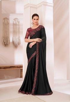 This stunning designer saree is crafted to perfection for wedding wear and parties, ideal for adding a touch of elegance to your special occasions. Made from luxurious silk chiffon, the saree features exquisite sequence embroidery work that glimmers with every movement, enhancing its sophisticated appeal. The 6.5-meter length provides ample fabric to drape elegantly, creating a regal silhouette perfect for weddings or festive celebrations. The saree is paired with a Banglori silk net blouse that complements the overall look. The blouse is adorned with intricate thread and sequence embroidery work, adding depth and richness to the ensemble. This saree effortlessly combines traditional craftsmanship with modern aesthetics, making it a timeless addition to your wardrobe, perfect for capturing Sari India, Saree Borders, Blue Silk Saree, Saree Style, Picture Canvas, Latest Indian Saree, Traditional Saree, Black Saree, Indian Saree