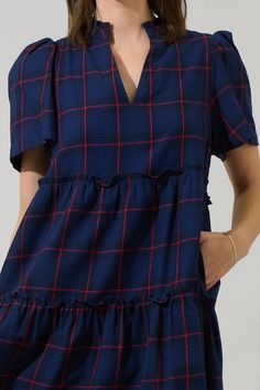 Good days come easy when you're wearing the Amelia Tiered Babydoll Short Sleeve Dress. This pretty plaid pattern features a banded collar, split neckline with short sleeves. Side pockets are added for convenience. You can easily wear it with heels for a complete look. - Plaid- Split neck- Pockets- Puff sleeves- Color: Navy RedSize + Fit - Model is 5'9" and wearing size XS- Measurements taken from size S - Chest: 19 1/2"- Length: 34 1/2" Fabric Self: 100% Cotton, Lining: 97% Polyester 3% Spandex Short Babydoll Dress, Camisole Bra, Wrap Jumpsuit, Bra Dress, Body Dress, Curve Dresses, Skirt Leggings, Short Sleeve Dress, Babydoll Dress