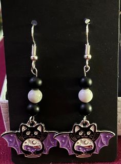 A single pair of earrings of a cat with a crystal ball.  All earrings come with double backings! Crystal Ball Earrings, Ball Earrings, Wedding Jewelry Earrings, Colorado Springs, Crystal Ball, Wedding Earrings, A Cat, Wedding Jewelry, Springs