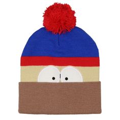 a beanie hat with two eyes and a red pom - pom on top