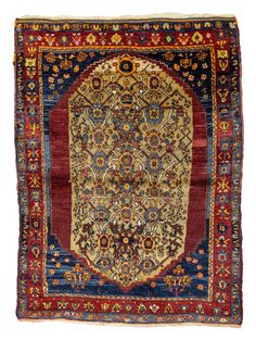 an antique persian rug with red, blue and yellow colors on the bottom half of it