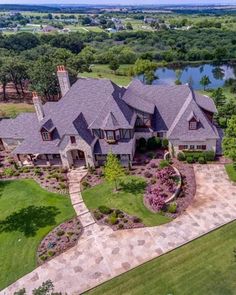 an aerial view of a large home in the country