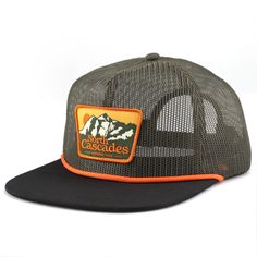 Be cool and eco-friendly with this North Cascades National Park All Mesh Cap! The all-mesh design keeps you comfy and ventilated on hot summer days, while the recycled materials are friendly to the environment. Plus, it comes with a vintage inspired patch that celebrates North Cascades National Park, for the perfect custom cap. It's a no-brainer! Mesh: 100% Recycled Polyester Brim: 100% Organic cotton Visor: Recycled board Coolmax sweatband for extra comfort Shape/ Profile: Mid Profile Unique, v Vintage Summer Trucker Hat For Outdoor Activities, Retro Trucker Hat With Flat Bill For Outdoor, Retro Flat Bill Trucker Hat For Outdoor, Green Vintage Trucker Hat For Outdoor, Retro Trucker Hat With Curved Bill For Outdoor, Casual Mesh Snapback Hat For Outdoor Activities, Retro Trucker Hat For Outdoor Activities, Casual Mesh Trucker Hat For Outdoor Activities, Casual Mesh Hats For Camping