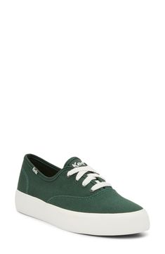 Kick off your everyday ensembles with this classic cotton-canvas sneaker set atop a platform cupsole with plush cushioning on the inside. Lace-up style Cushioned footbed Textile upper and lining/rubber sole Imported Trendy Cotton Platform Sneakers For Streetwear, Casual Green Low-top Platform Sneakers, Trendy High-top Cotton Sneakers, Casual Green Platform Sneakers With Contrast Sole, Trendy Green Canvas Shoes With Rubber Sole, Casual Green Platform Sneakers With Round Toe, Cotton Platform Sneakers With Contrast Sole, Green Platform Sneakers With Vulcanized Sole For Spring, Trendy Canvas Shoes With Rubber Sole For Everyday