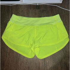 Size 4 2.5 Perfect Condition New Without Tags Yellow Athletic Shorts With Built-in Shorts For Workout, Yellow Athletic Shorts With Built-in Shorts For Sports, Yellow Athletic Shorts With Built-in Shorts For Spring, Yellow Short Gym Bottoms, Yellow Short Bottoms For Gym, Neon Yellow Sports Shorts For Summer, Yellow Athleisure Athletic Shorts For Beach, Yellow Activewear With Built-in Shorts For Spring, Yellow Sporty Beach Activewear