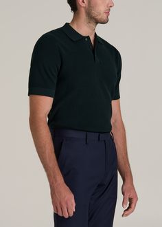 Purl Knit Polo for the Tall Man with Style Refined Relaxation Elevate your casual look with our Purl Knit Tall Men's Polo Shirt. This isn't just an extra-long polo shirt—it's a statement of sophistication made with the taller guy in mind. The modern fit and longer-than-hip length ensure a sleek silhouette without sacrificing comfort. Whether it’s for a smart-casual meeting or a weekend getaway, this men's tall polo shirt, with its ribbed hem and cuffs, ensures you stand out in the best way possi Casual Wool Ribbed Polo Sweater, Casual Ribbed Wool Polo Sweater, Green Wool Casual Tops, Casual Green Wool Tops, Casual Merino Wool Polo Sweater For Business Casual, Casual Merino Wool Polo Sweater, Casual Knitted Merino Wool Polo Sweater, Casual Knitted Polo Sweater For Work, Purl Knit