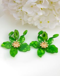 Light green flower earrings. Ideal for evenings, weddings, parties, proms, photoshoots, and on every day.   Earrings made of high-quality crystal and acetate CUSTOM ORDER It is Fully HANDMADE earrings and if you want to purchase this earring in a different color or size, send me please a direct message. If you have any questions don't be hesitate to ask me. Please visit my shop to see more models made by me https://www.etsy.com/shop/LaranBijou DIMENSIONS Length - 8cm (3 inch) Weight 15 grams Cli Flower Drop Earrings For Party, Drop Earrings With Flower Decoration For Party, Party Flower Drop Earrings, Party Flower Decoration Drop Earrings, Green Flower Shaped Earrings For Party, Green Flower Earrings For Party, Green Flower Shaped Jewelry For Party, Green Flower-shaped Party Earrings, Green Flower Shaped Party Earrings