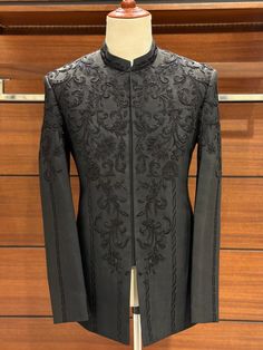 Elevate your style with our Black Embroidered Prince Coat, a masterpiece in pure silk, dyeable to you desired hue!. Immerse yourself in the sophisticated pattern, adorned with hand stitched zardozi work for an extra touch of elegance and premium allure. A crowd favourite, our Prince Coat isn't just good; it's premium quality, crafted to perfection. Each piece is made to measure, ensuring a fit as unique as you are. Expect a personalized measurement form, and we might even give you call for preci Elegant Silk Sherwani With Resham Embroidery, Silk Sherwani With Embroidery For Reception, Elegant Embroidered Silk Sherwani, Long Sleeve Silk Sherwani For Reception, Elegant Silk Sherwani With Traditional Drape, Embroidered Silk Bandhgala For Reception, Silk Bandhgala With Intricate Embroidery For Wedding, Elegant Outerwear With Intricate Embroidery For Reception, Elegant Brocade Tuxedo For Wedding