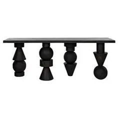 a table with three black vases on it and one is made out of wood