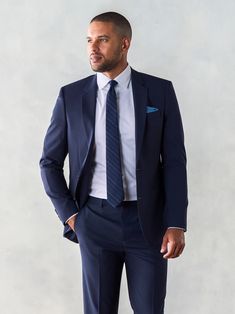 Stretch Wool True Navy Suit – The Black Tux - Buy New Classic Blue Pantsuit With Notch Lapel, Classic Blue Semi-formal Pantsuit, Slim Fit Notch Lapel Suits For Business Trips, Professional Navy Blazer For Formal Occasions, Classic Blue Tailored Pantsuit, Navy Professional Blazer For Formal Occasions, Tailored Blue Business Pantsuit, Tuxedo Style Pantsuit For Business Casual, Classic Blue Business Pantsuit