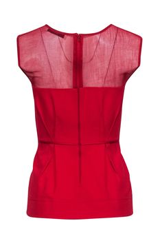 Add a pop of color to your wardrobe with this ravishing red sleeveless peplum top by Stella McCartney. The delicate mesh upper adds a touch of edge to the classic peplum style. Perfect for any occasion, this top is sure to turn heads! Size 6 (IT 42) Made in Italy 69% Viscose, 21% Polyamide, 5% Elastane, 5% Cotton Unlined Exposed back zipper Mesh upper Peplum fit Bust 32" Waist 26" Shoulder to hem 24" Summer Evening Top With Sheer Bodice, Summer Evening Fitted Peplum Top, Chic Sleeveless Sheer Top, Elegant Summer Tops With Sheer Bodice, Elegant Sheer Bodice Top For Summer, Elegant Sleeveless Peplum Top For Summer, Fitted Sleeveless Top With Sheer Bodice, Sleeveless Sheer Bodice Top For Party, Sleeveless Peplum Top For Evening