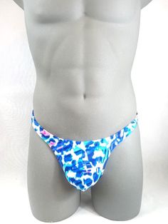 Bare what you dare The shaped bikini like thong gives you a contour line to show off that sculpture hard body lines,3/8 covered elastic waistband and 1/4 elastic around the leg.MADE IN USA PLEASE NOTE: All print fabric designs swimsuits varies, no two are alike. Contour Line, Blue Leopard, Hard Body, Fabric Designs, Mens Swim Trunks, Color Print, Chicago Il, Print Fabric, Swim Trunks