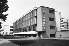 an old black and white photo of a building with the word bauchs on it