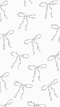 white bows are tied together on a white wallpaper background that is seamless and easy to draw