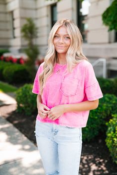 Introducing our Sitting In The Sun Mineral Wash Tee - Pink – the epitome of laid-back style fused with comfort. Crafted from premium mineral wash fabric, this tee boasts a unique texture and softness that will keep you cool and cozy all season long. Its short sleeves offer a casual charm perfect for sunny days and relaxed outings. Elevate your summer wardrobe with this effortlessly cool essential. The Fabric: 100% Cotton. The Fit: Faded pink fabric. Chest pocket. Raw detailing. Short sleeves. Mineral wash. Sizing runs true. Model is shown wearing a small. Casual Pre-washed Tops For Spring, Spring Crew Neck Stonewashed T-shirt, Acid Wash Tops For Everyday Spring Wear, Acid Wash Soft-washed Tops For Loungewear, Spring Loungewear Washed T-shirt, Acid Wash Soft-washed Relaxed Fit Top, Everyday Acid Wash T-shirt For Spring, Everyday Stonewashed Short Sleeve Tops, Acid Wash Pre-washed Relaxed Fit Tops