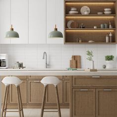 two stools are in front of the kitchen counter