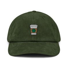 Tea and Coffee lovers rejoice! This is the perfect gift for someone who loves a hot cup of joe and is always on the run... and that someone might be you! Treat yourself with this adorable corduroy dad hat to show off your love of lattes, cappuccinos, americanos, teas and more! A hat made of corduroy? That's a yes! Get your hands on a hat that'll serve you for ages. The corduroy fabric has stood the test of time thanks to its best features--softness, affordability, and durability. Get yours now! * 100% cotton corduroy * Soft, unstructured crown * Cotton twill sweatband and taping * Adjustable buckle This product is made especially for you as soon as you place an order, which is why it takes us a bit longer to deliver it to you. Making products on demand instead of in bulk helps reduce overp Embroidered Corduroy, Corduroy Hat, Hat Handmade, Dad Cap, Embroidered Caps, Dad Caps, Dundee, Ear Warmers, Four Leaf Clover