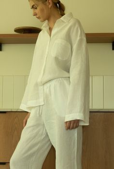 Relaxed fitting, lightweight linen pants are designed for comfortable moments during sleep. Made using 100% softened linen from a medium weight fabric. The pants come with an adjustable elastic waistband with a drawstring. Each shipment is prepared as a gift! We ship in original white Launil boxes. Gift message available (please write the message in the comments field).  DETAILS: - WHITE GARMENT MADE FROM 100% LINEN FABRIC - OEKO-TEX CERTIFIED FABRIC - STONE WASHED FOR MAXIMUM SOFTNESS - THE MODEL IS 177 CM TALL AND WEARING A SIZE S - LOOSE AND COMFORTABLE FIT - HIGH-WAISTED PANTS - ELASTIC WAISTBAND - WAIST ADJUSTABLE WITH DRAWSTRINGS - INSEAM SIDE POCKETS CARE: - MACHINE WASH UP TO 40oC/104oF USING THE GENTLE CYCLE - WASH LIGHT AND DARK COLOURS SEPARATELY - USE MILD, ENVIRONMENTALLY FRIE High Waist Pants, Sleep Pants, Linen Trousers, Gift Message, Linen Clothes, Waist Pants, Pants Trousers, Linen Pants, High Waisted Pants