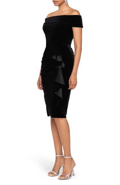 Slip into this little black dress with confidence knowing that it's stunning with an off-the-shoulder neck and a frilly ruffle down the skirt. 38 1/2" center front length (size 8) Off-the-shoulder neck Short sleeves Lined 90% polyester, 10% spandex Dry clean Imported Elegant Christmas Dresses Women, Elegant Cocktail Dress Party Classy Knee Length, Elegant Knee-length Dress With Ruffled Skirt, Chic Ruched Dress For Black-tie Events, Fitted Ruched Dresses For Black-tie Events, Formal Knee-length Dress With Ruffled Skirt, Black Ruched Dress For Black-tie Events, Cocktail Dresses Classy, Elegant Cocktail Dress Party