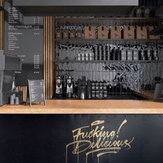 the front counter of a coffee shop with writing on it