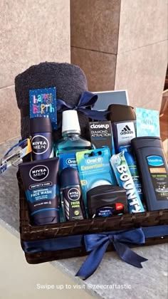 a basket filled with men's grooming products on top of a countertop