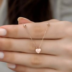 Crafted from high-quality sterling silver, this necklace is both stylish and durable, making it the perfect gift for a loved one on any occasion. Metal: 925 sterling silver; Coating: 18k rose gold Necklace length: 17"(42.5cm) + 2" (5cm) chain extender Chain style: cable link Hypoallergenic: nickel-free materials used therefore suitable for those with metal allergies Silver Heart Pendant, Chain Extenders, Small Heart, Rose Gold Necklace, Gold Plated Chains, Gold Plated Silver, Heart Pendant Necklace, Necklace Length, Silver Heart