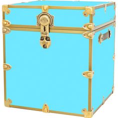 a large blue trunk with gold handles and rivets on the sides, is shown